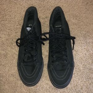 All black high top vans